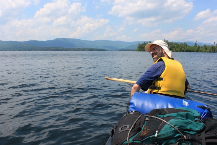 Some scruffy guy in a boat